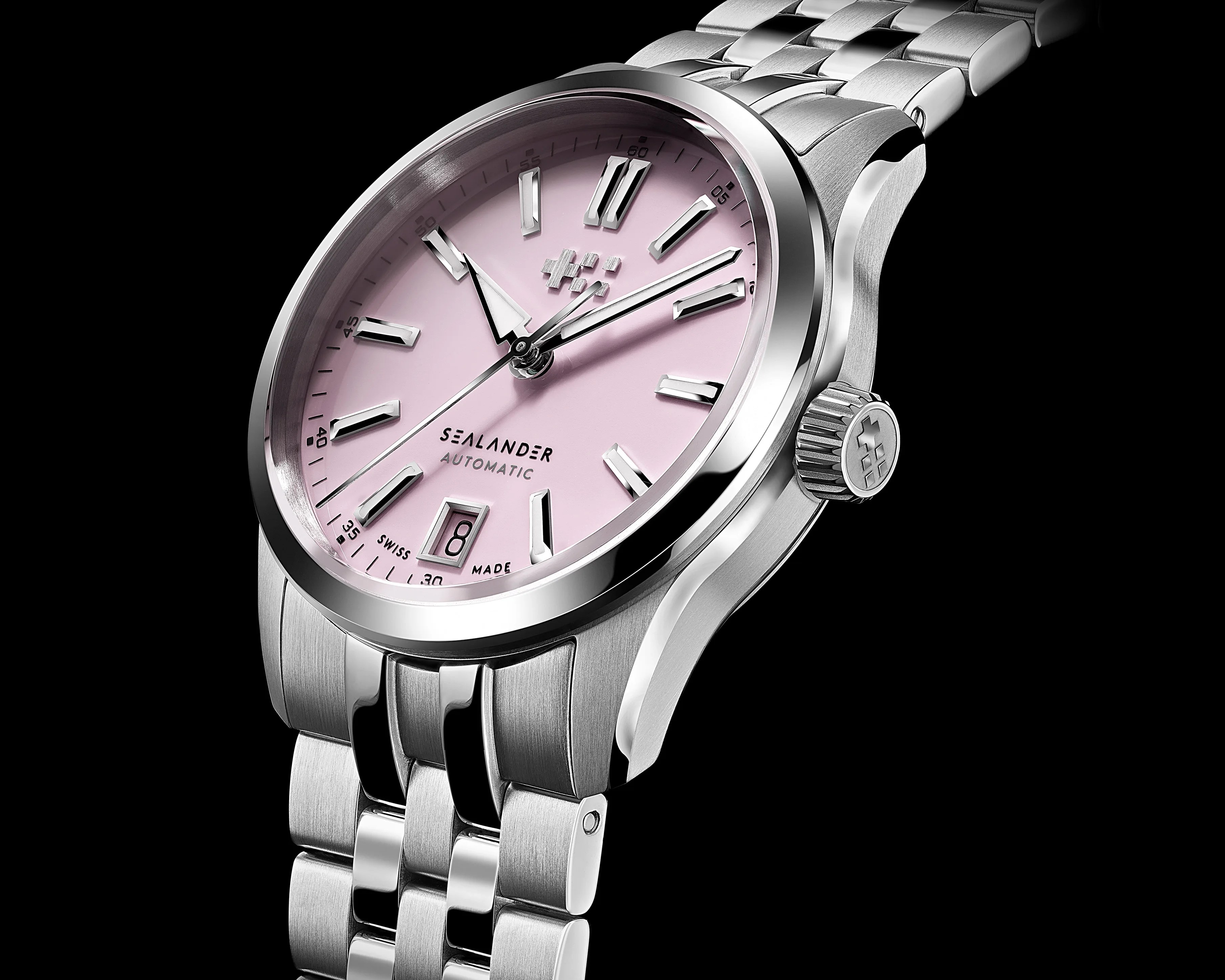 Silver metal wristwatch with a pink dial, silver hour markers, and a date window at 6 o'clock.