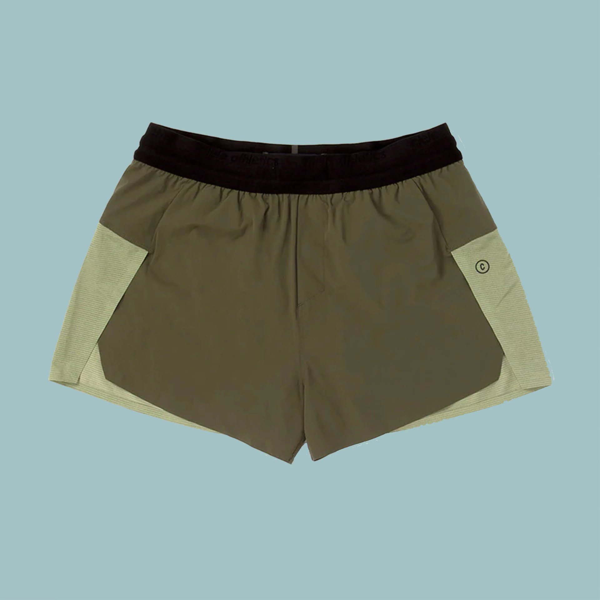 Olive green athletic shorts with light green side panels and a black elastic waistband.