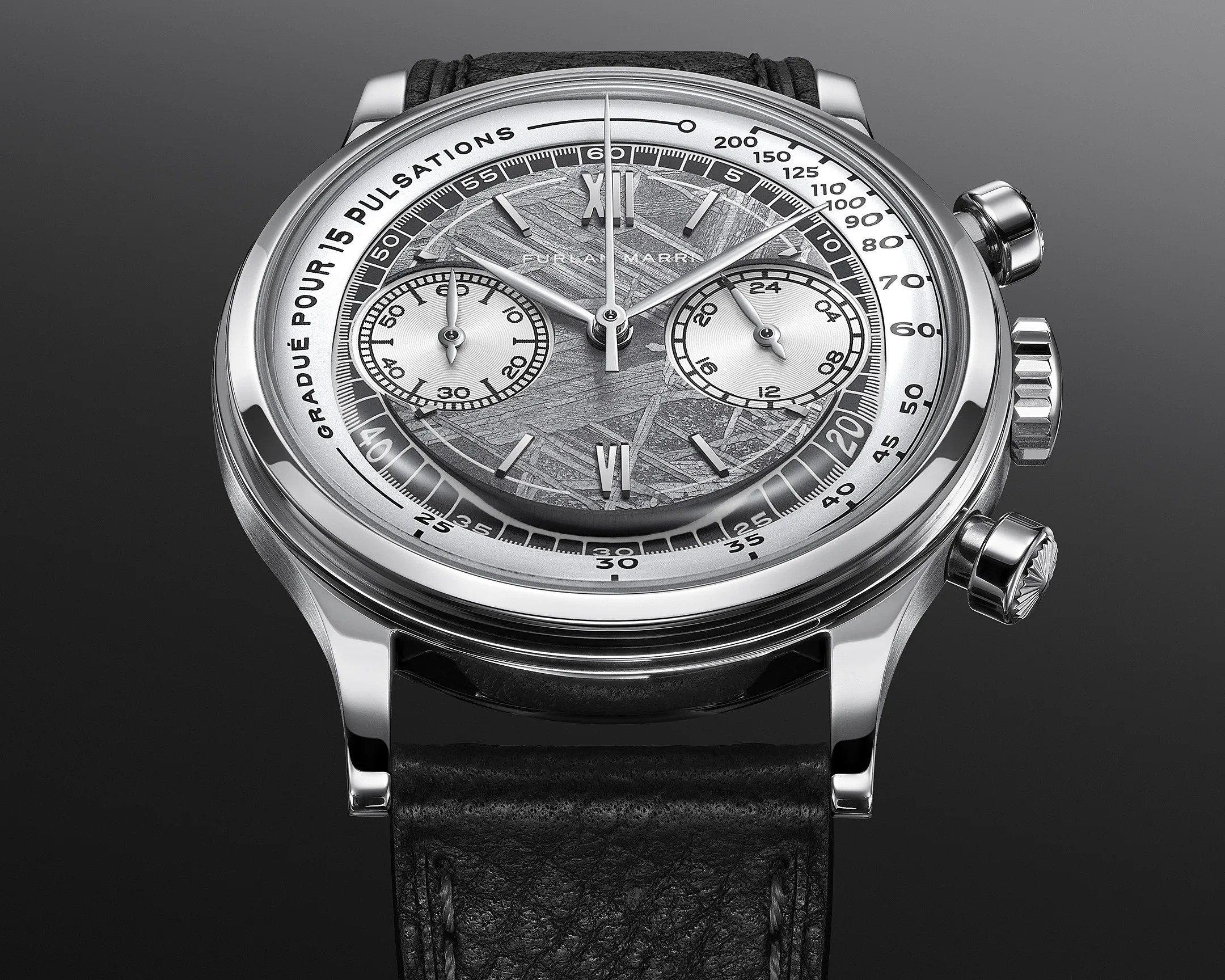 Silver chronograph wristwatch with textured gray dial, black leather strap, and pulsations scale on bezel.