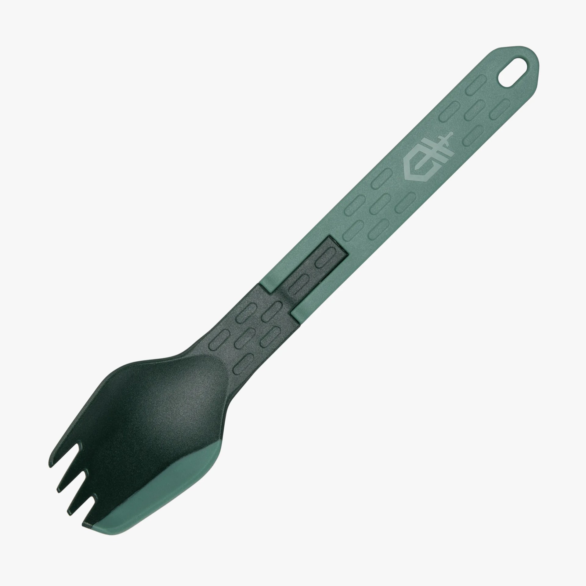 Green and black plastic spork with textured handle and a hole for hanging.