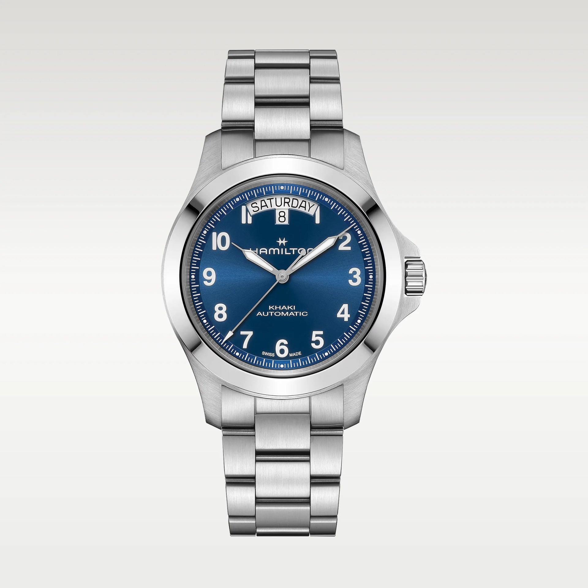 Silver stainless steel Hamilton Khaki automatic wristwatch with blue dial and day-date display.