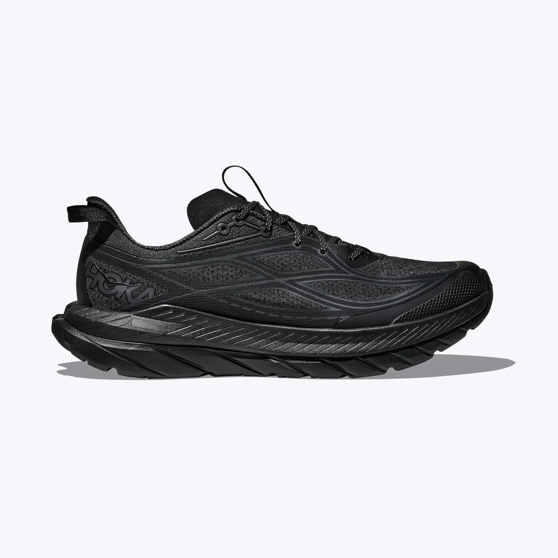 All-black Hoka running shoe with thick cushioned sole and mesh upper.