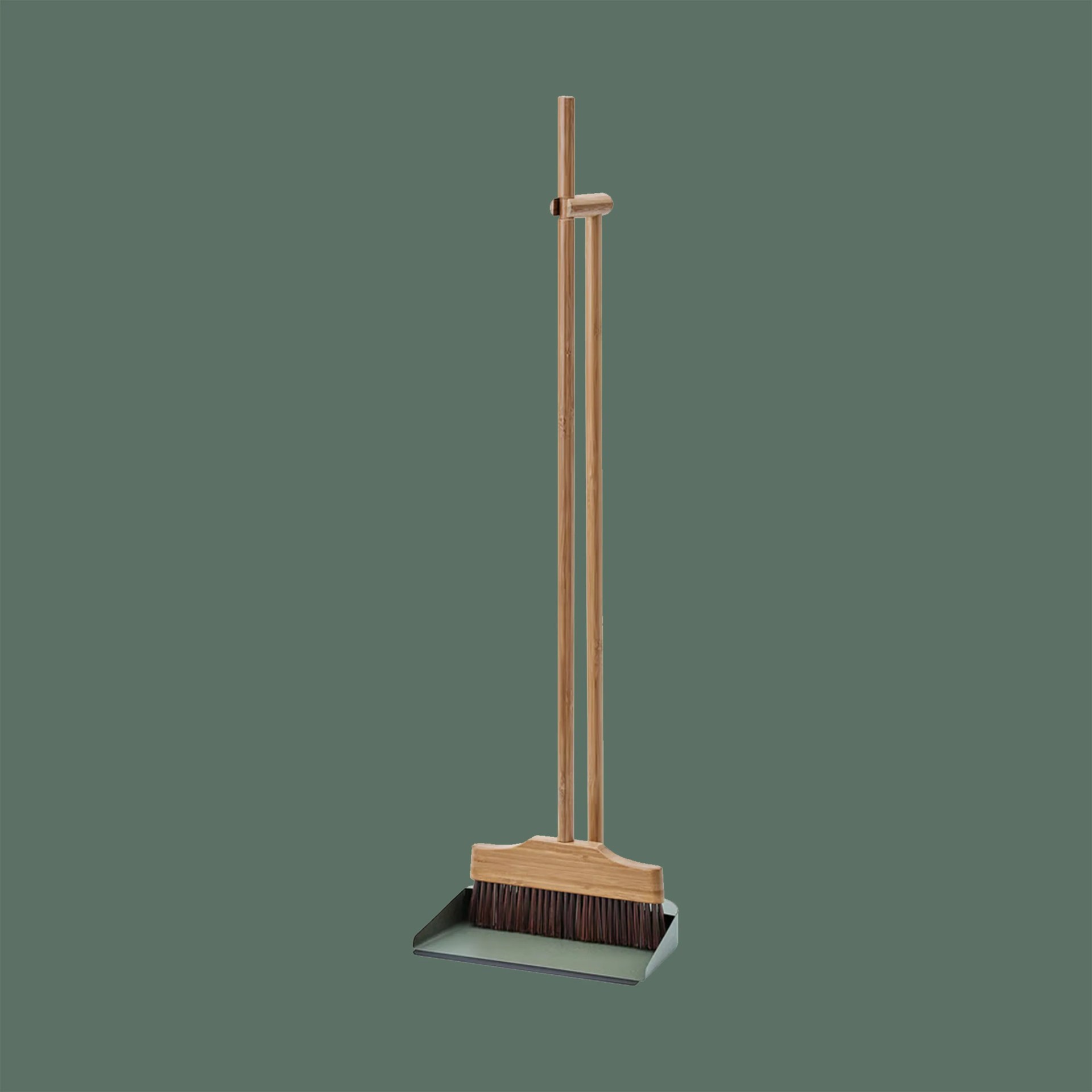 Wooden broom with dark bristles resting in a matching wooden-handled dustpan with a metal base.