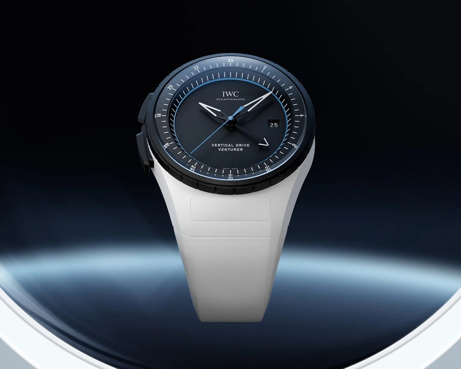 Black dial IWC Schaffhausen Vertical Drive Venturer watch with white strap on a dark gradient background.
