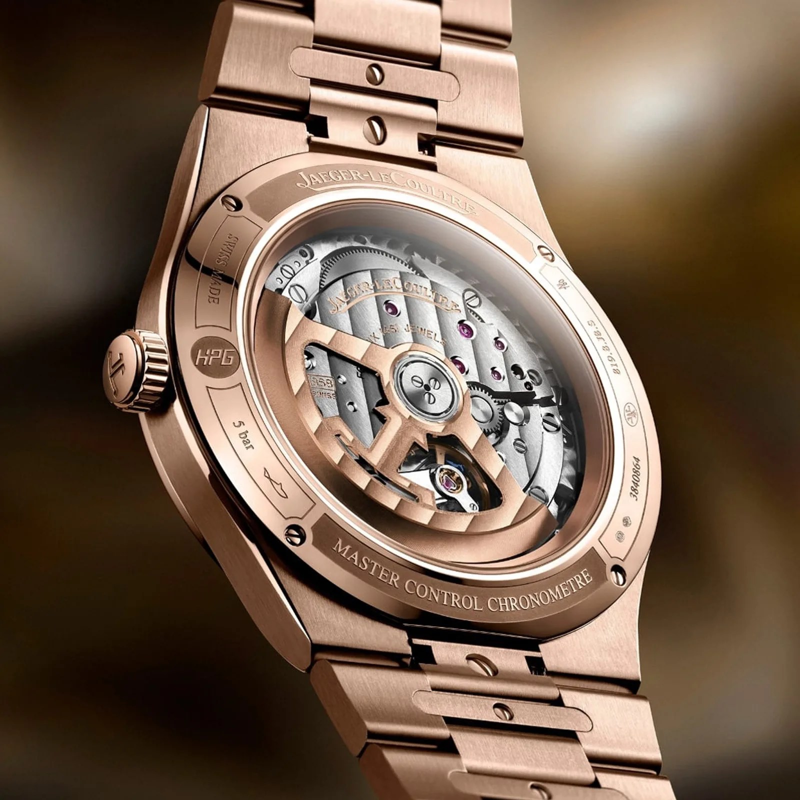 Rose gold Jaeger-LeCoultre Master Control Chronometre watch back showing intricate mechanical movement.