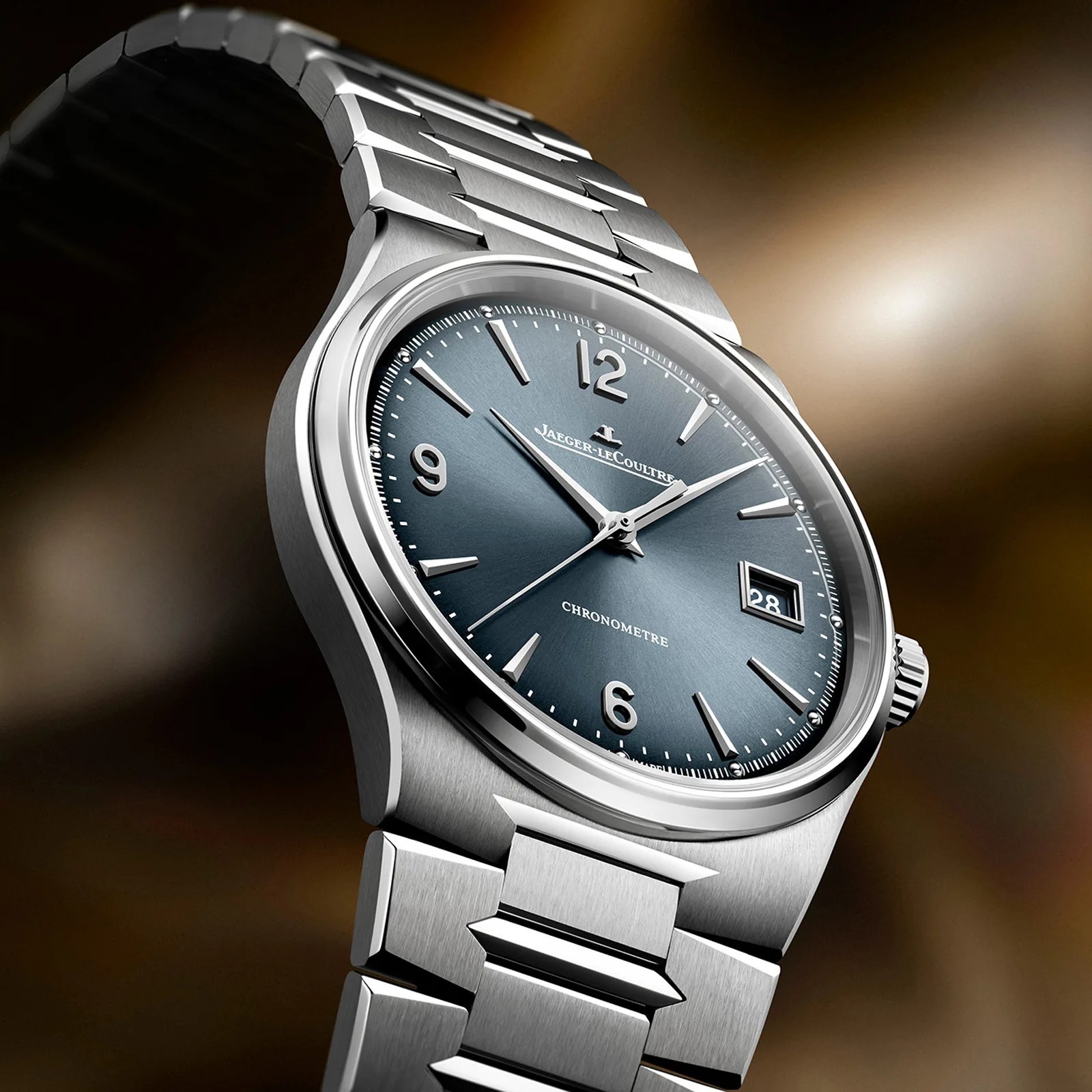 Stainless steel Jaeger-LeCoultre wristwatch with blue dial, silver hour markers, and date window at 3 o'clock.