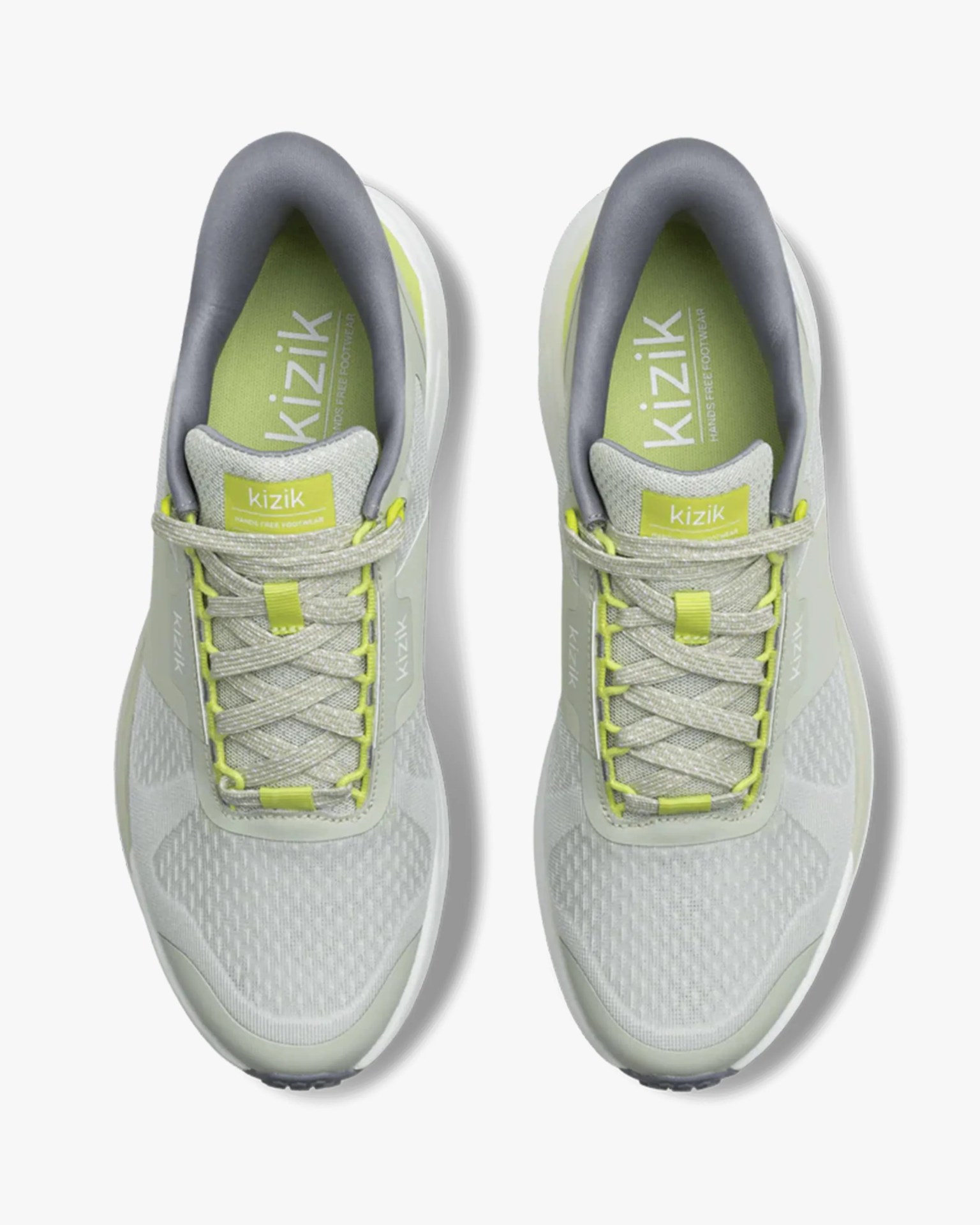 Pair of light gray and lime green Kizik sneakers with gray padded collars and laces on a white background.