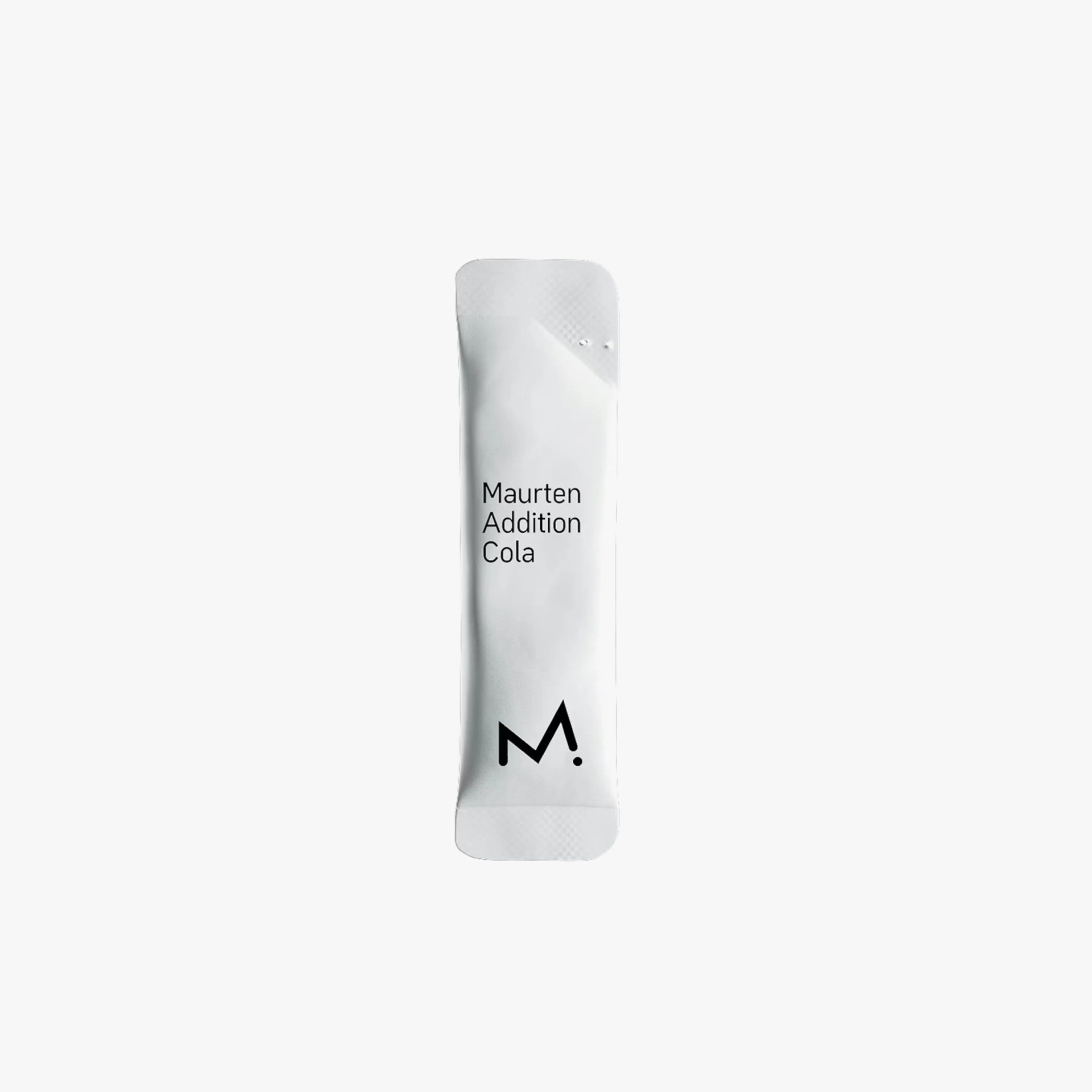 White Maurten Addition Cola energy gel packet with black text and logo on a white background.