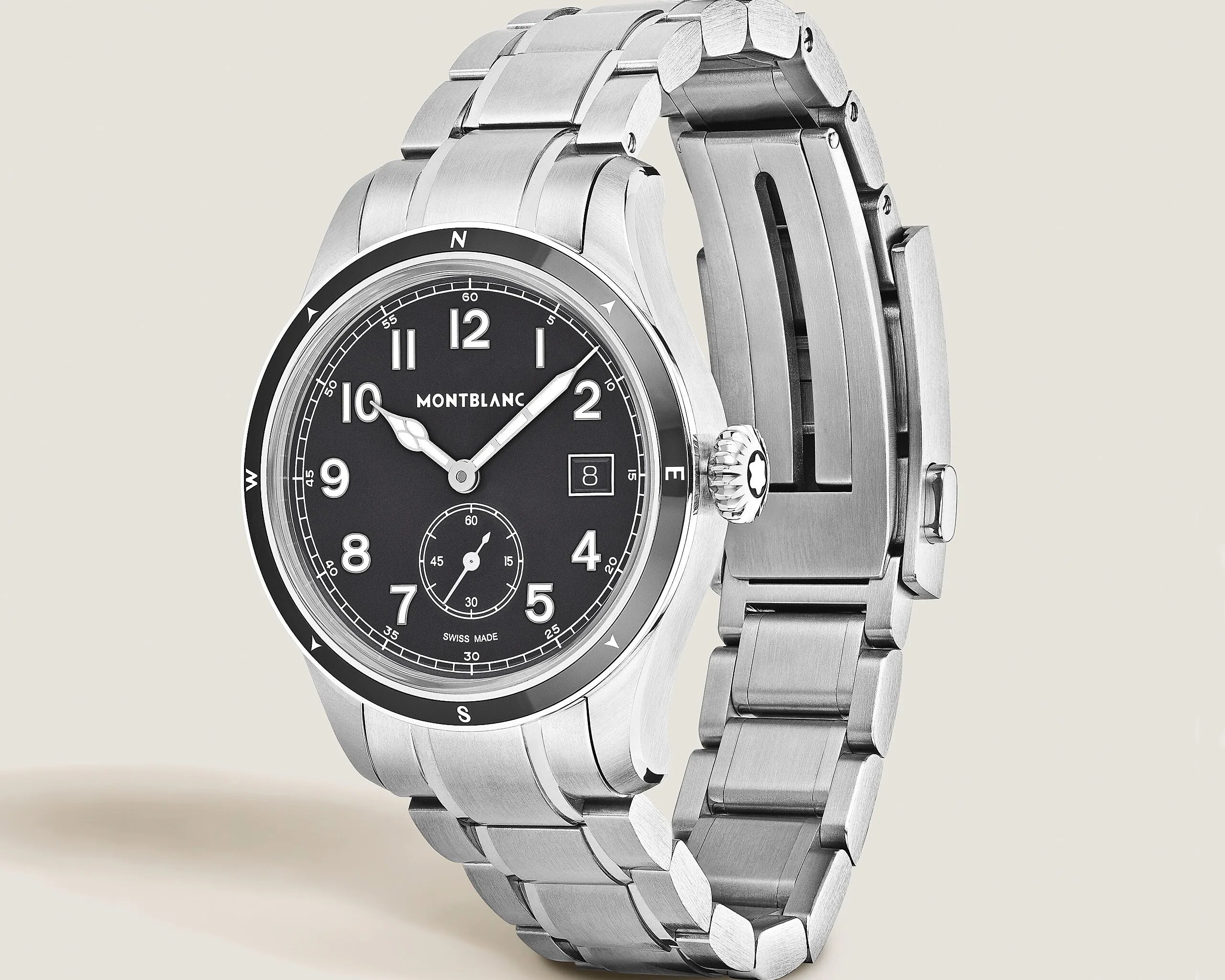 Montblanc stainless steel wristwatch with black dial, white numerals, date window, and metal link bracelet.