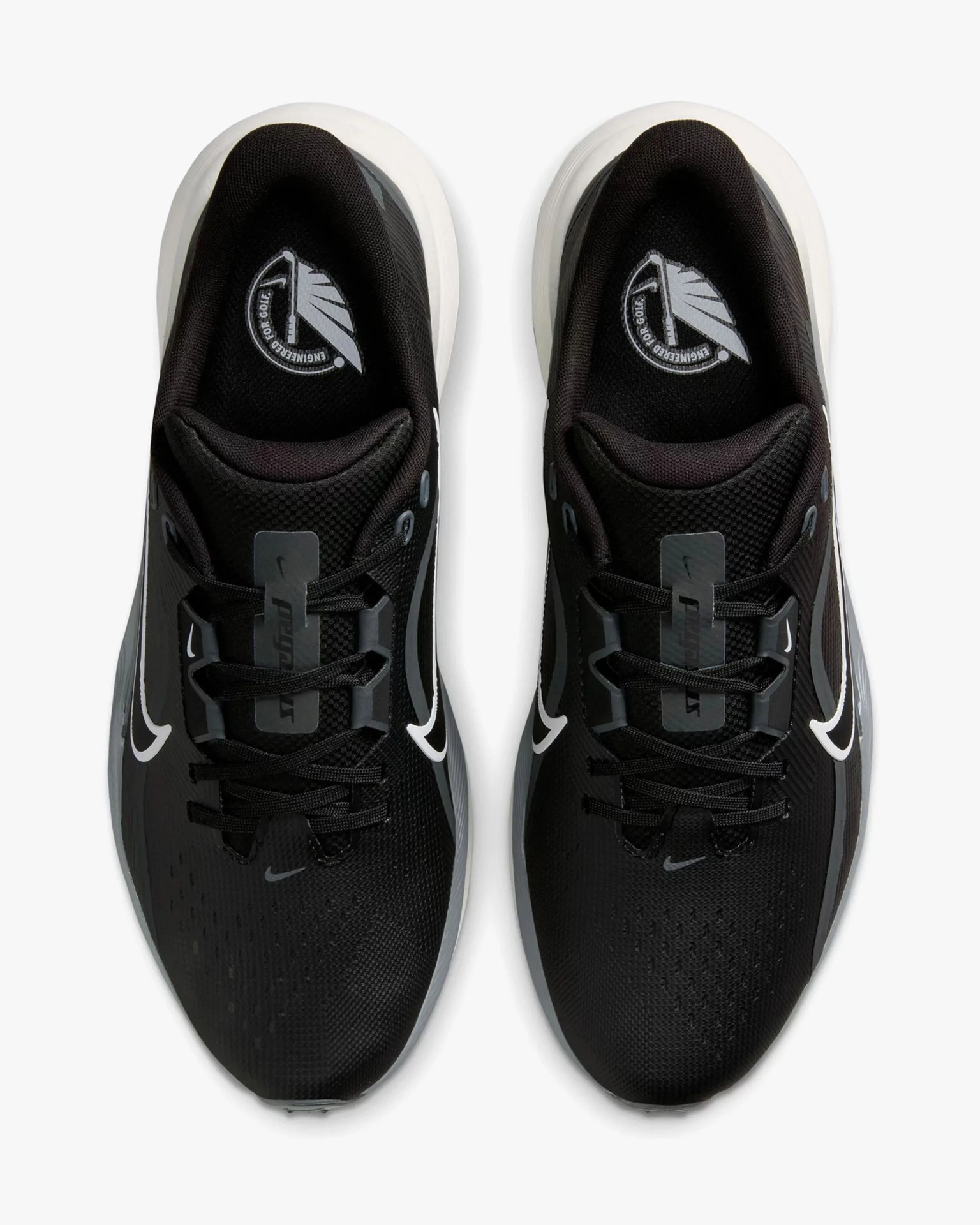 Pair of black Nike running shoes with white swoosh logos and white soles, viewed from above.