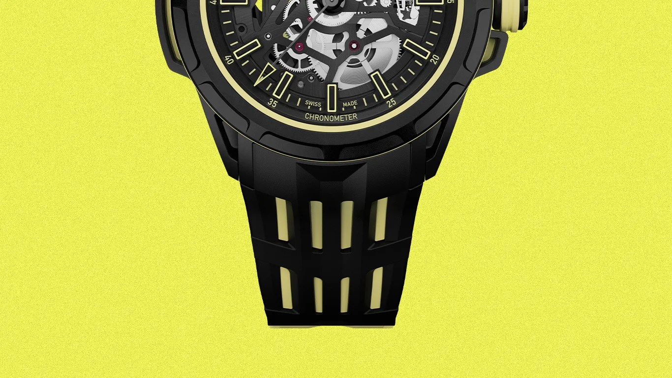 Black and yellow skeleton dial watch with black strap featuring yellow accents on a yellow background.