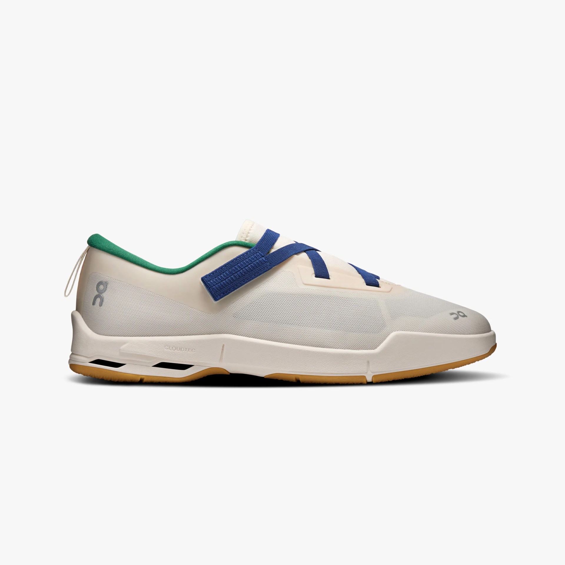 Off-white athletic shoe with blue straps, green inner lining, and gum sole, shown from the side.