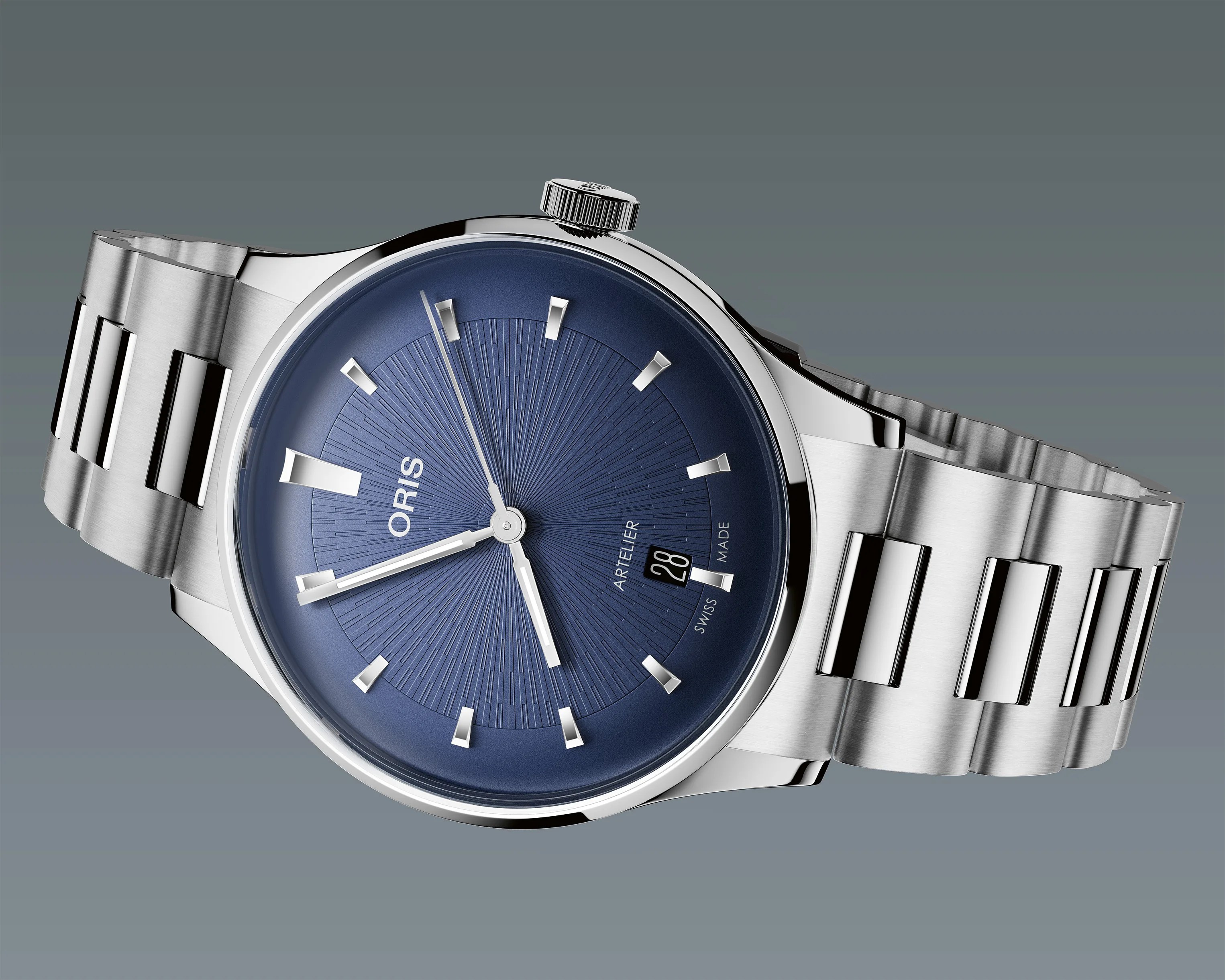 Silver stainless steel wristwatch with a blue textured dial and date display at 6 o'clock.