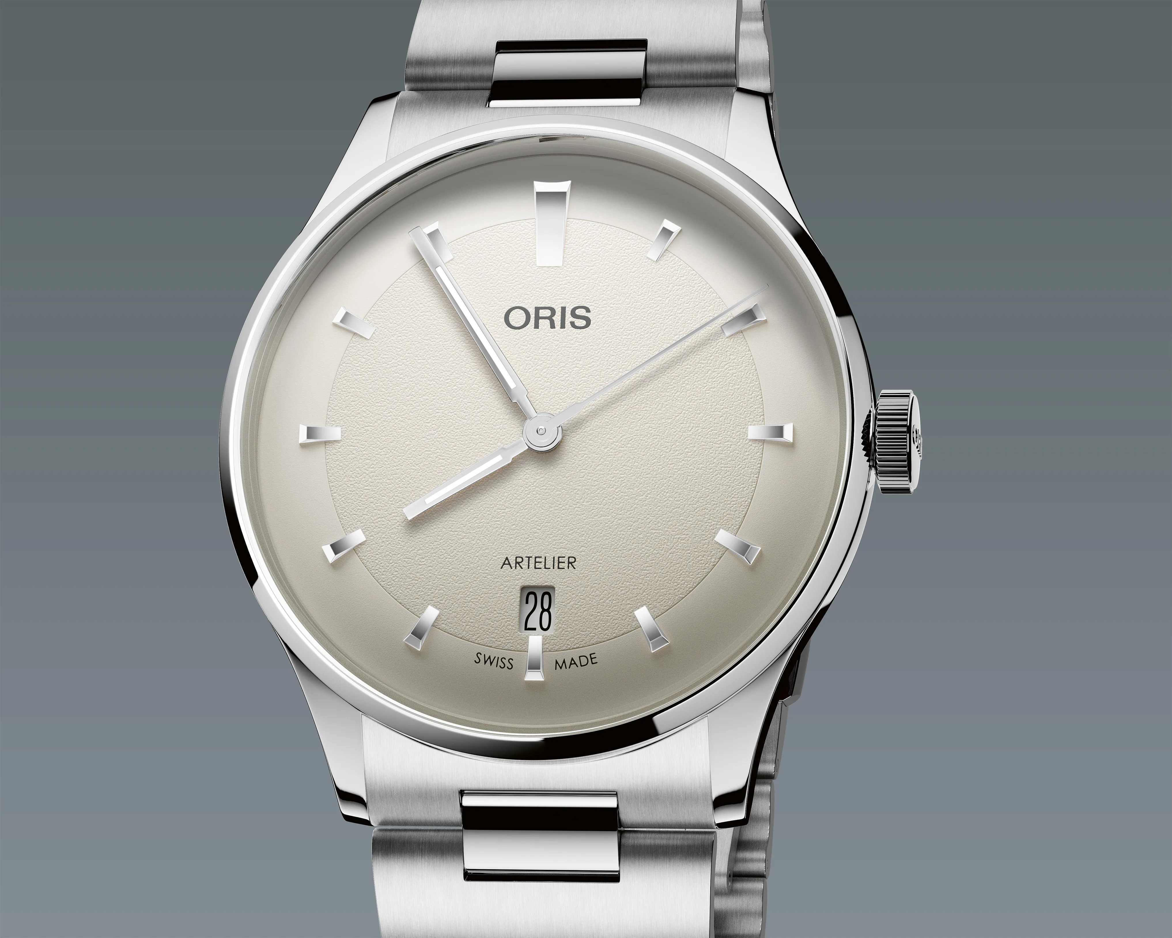Silver stainless steel Oris Artelier wristwatch with a cream textured dial and date display at 6 o'clock.