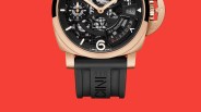 Rose gold watch with black skeleton dial, date display, and black rubber strap embossed with "CINE" on a red background.