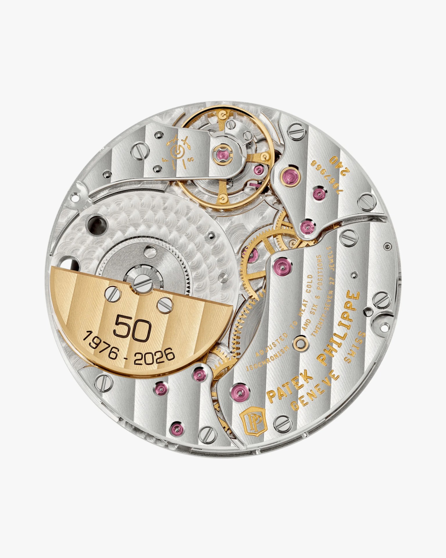 Round silver and gold Patek Philippe watch movement with visible gears and engraved "50 1976-2026" on the gold rotor.