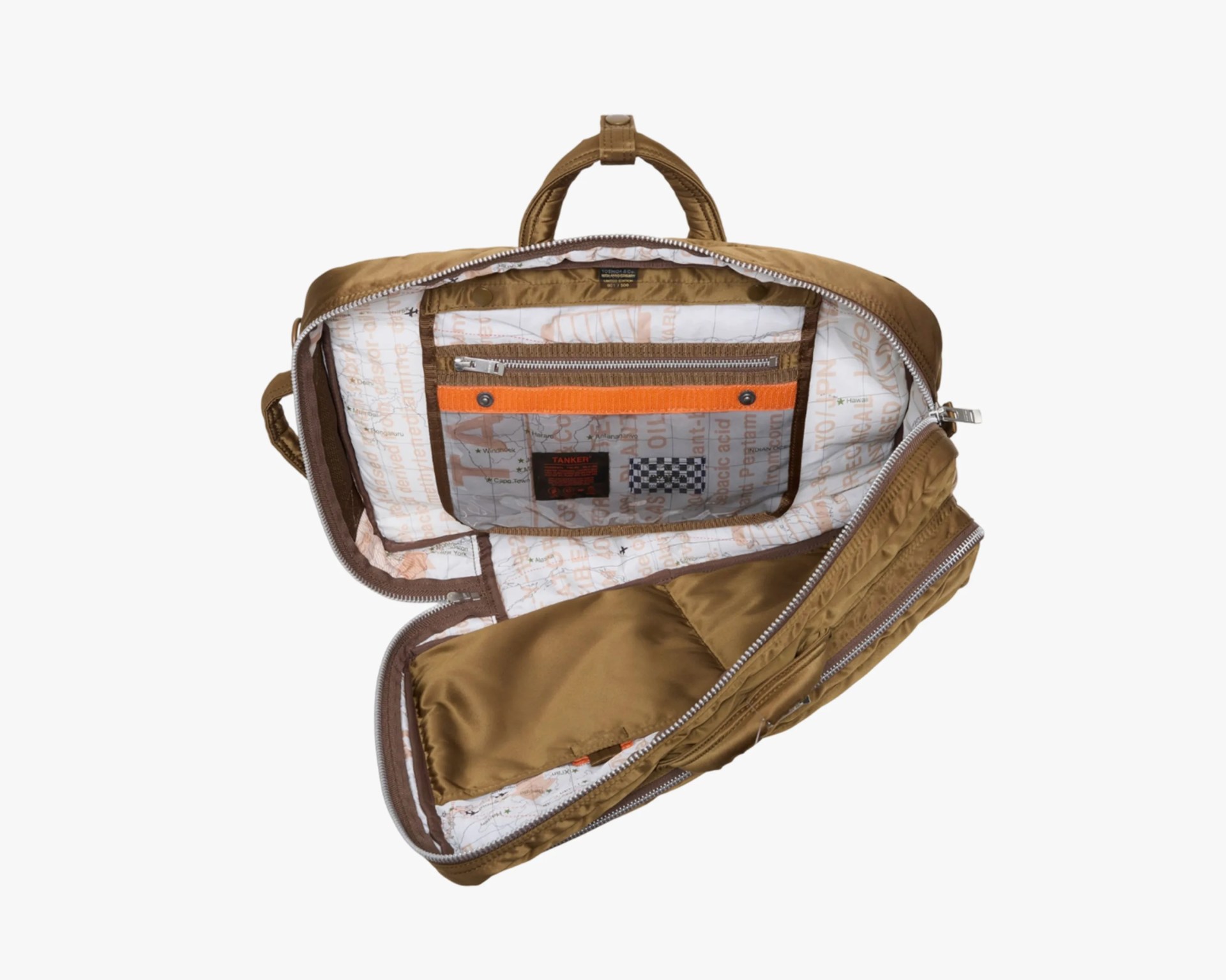 Brown nylon backpack opened to show white interior lining with printed text and zippered pocket.