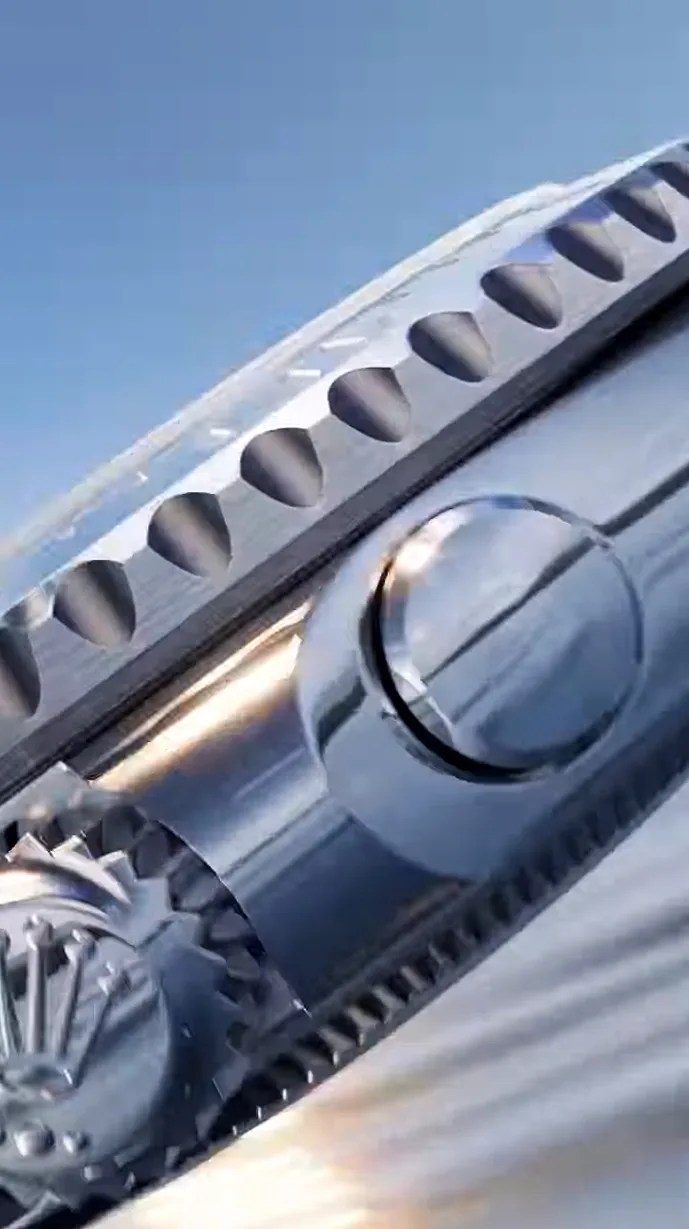 Close-up of a polished silver watch crown and bezel with the Rolex logo on the crown.