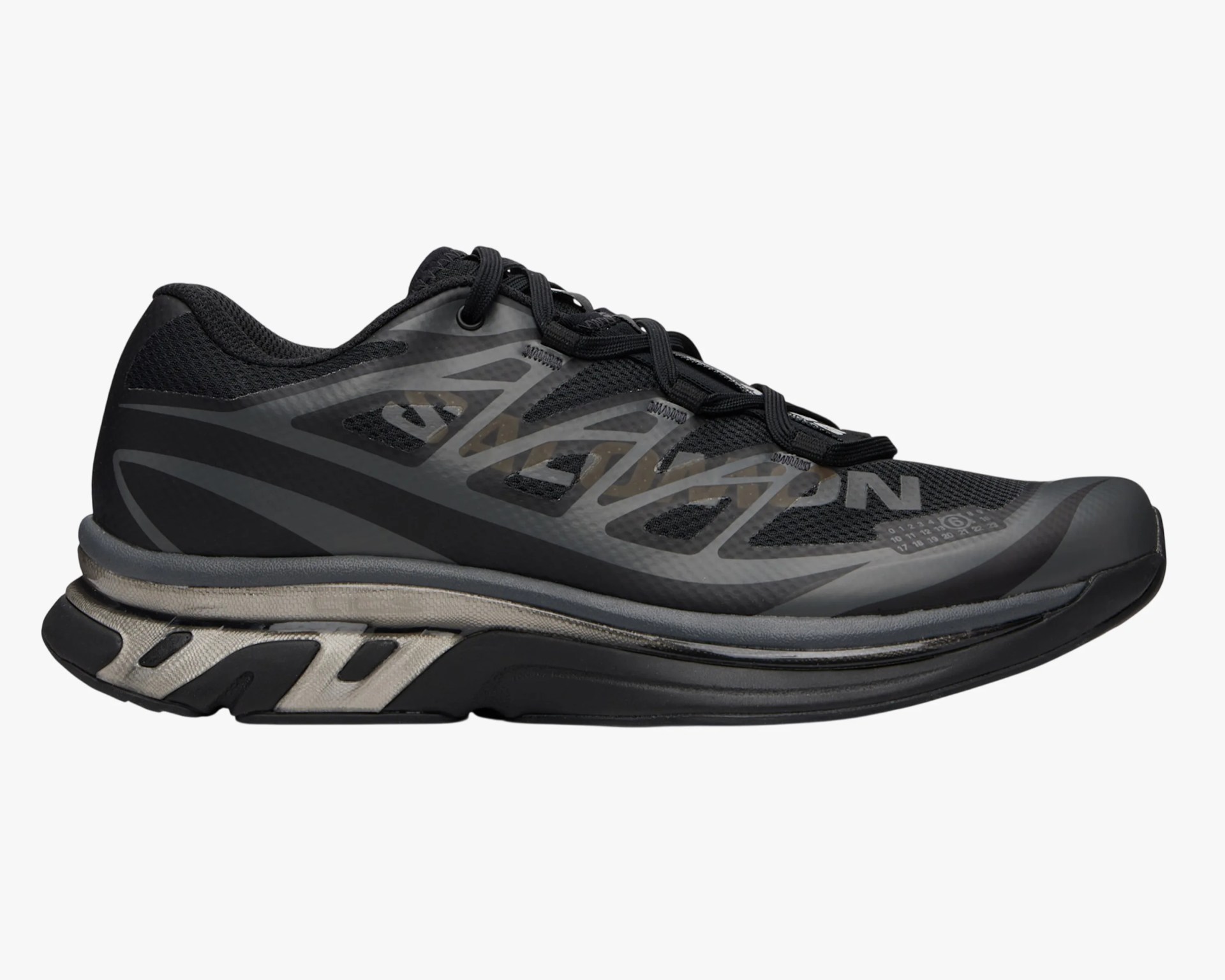 Black and gray Saucony running shoe with mesh upper and cushioned sole.