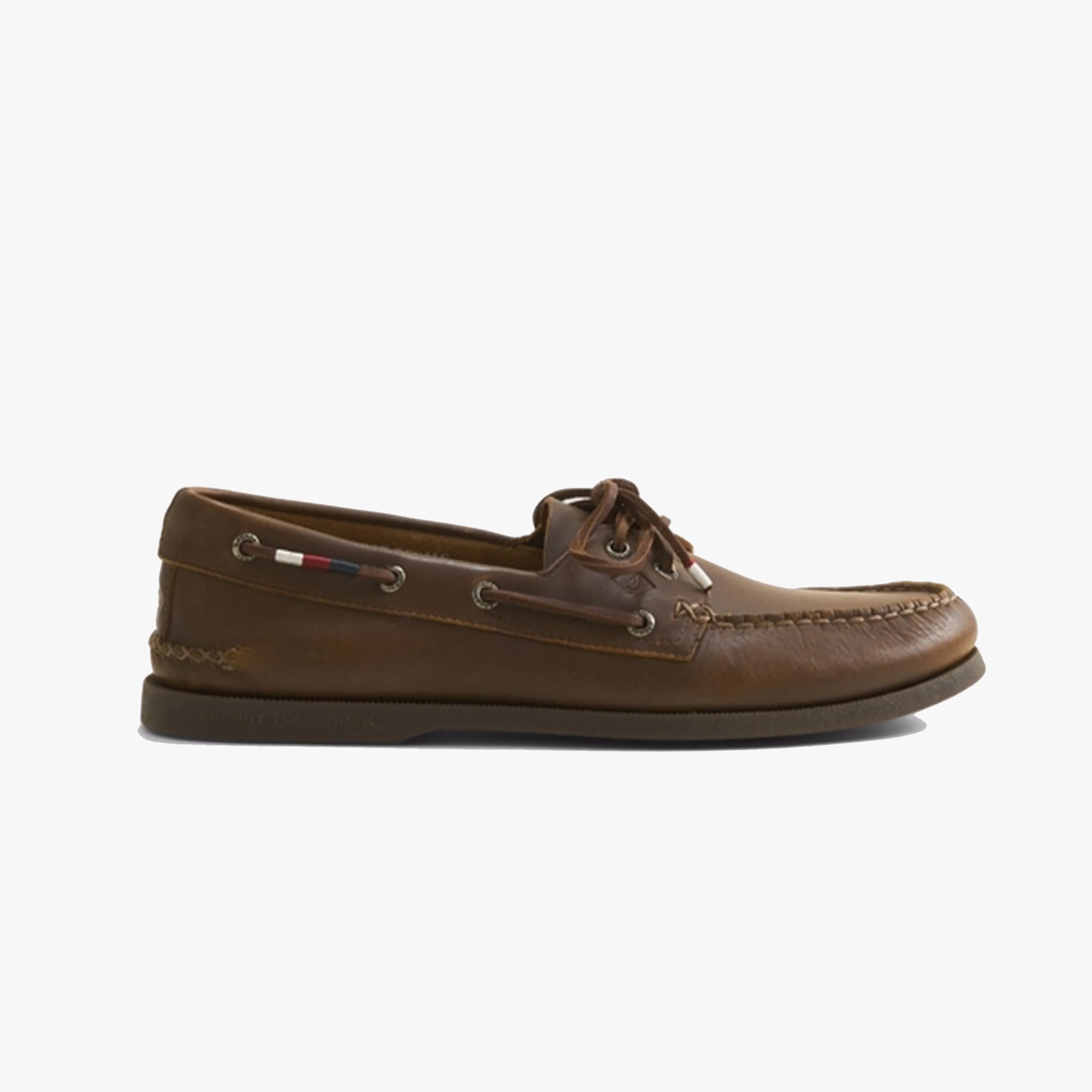 Brown leather boat shoe with moc toe stitching and lace-up front on a white background.