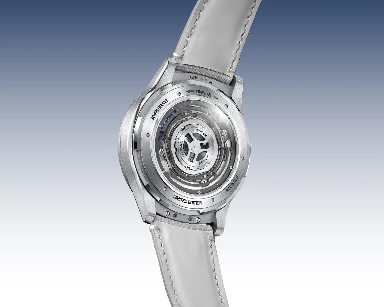 Back view of a silver limited edition wristwatch with visible intricate mechanical movement and white leather strap.