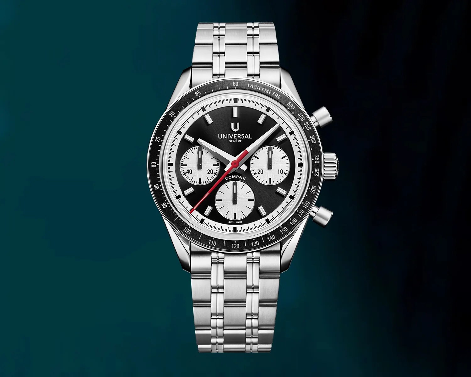Stainless steel Universal Gen&egrave;ve Compax chronograph watch with black and white dial and red second hand.
