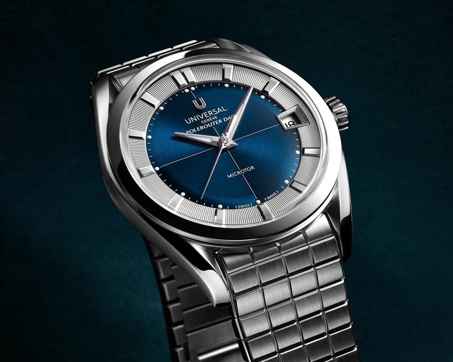 Stainless steel wristwatch with blue sunburst dial, silver hour markers, and date window at 3 o'clock.