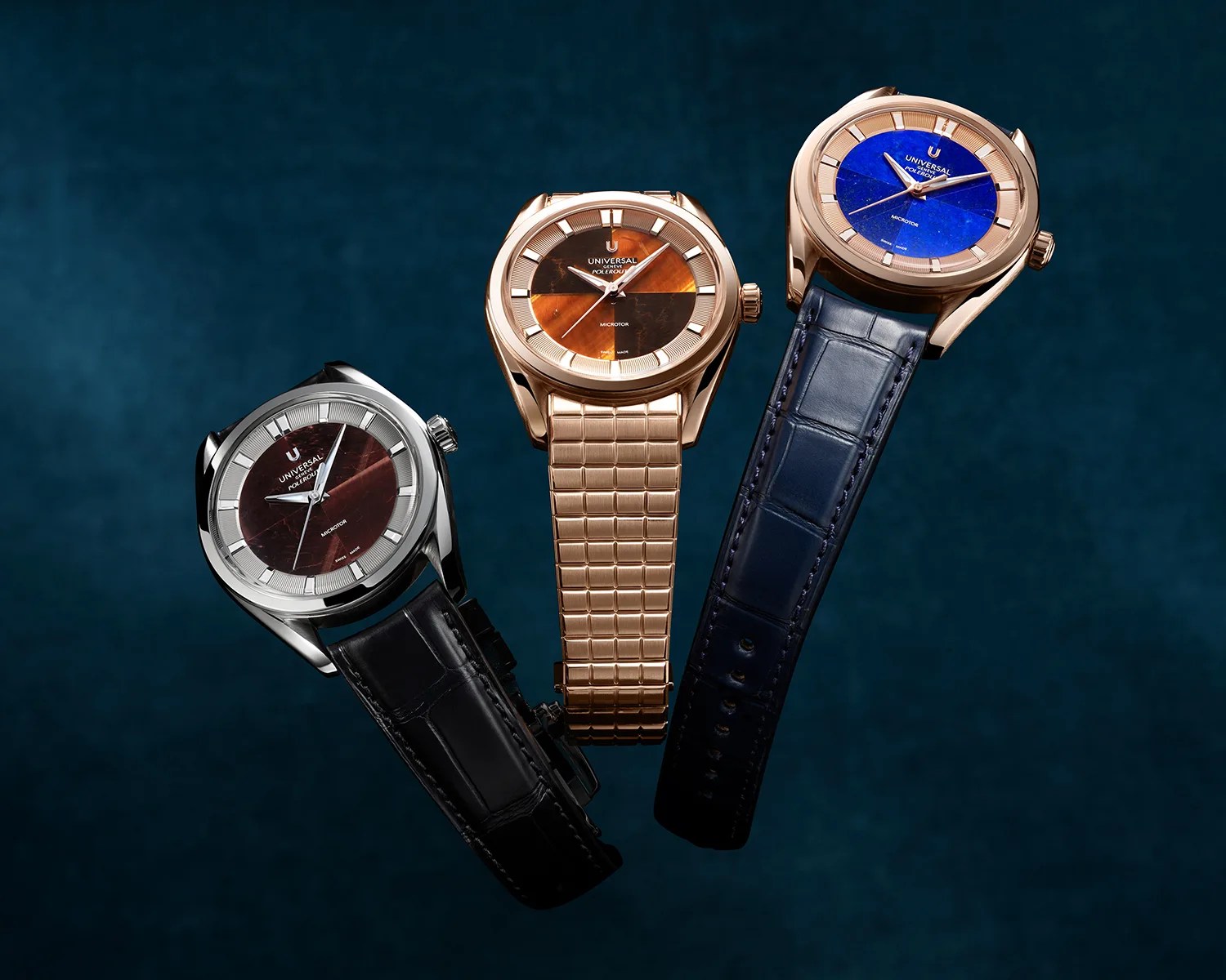 Three Universal Gen&egrave;ve Polerouter wristwatches with brown, orange, and blue dials, featuring leather and metal straps.