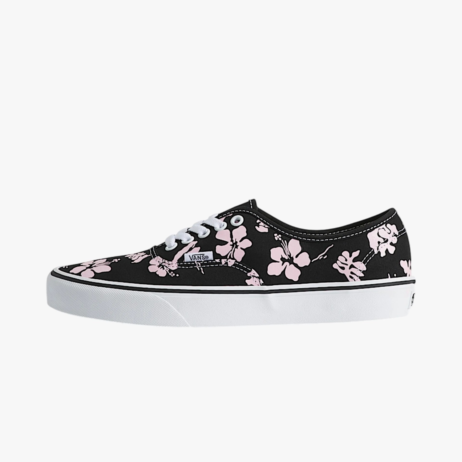 Black Vans sneaker with pink floral print, white laces, and white rubber sole.