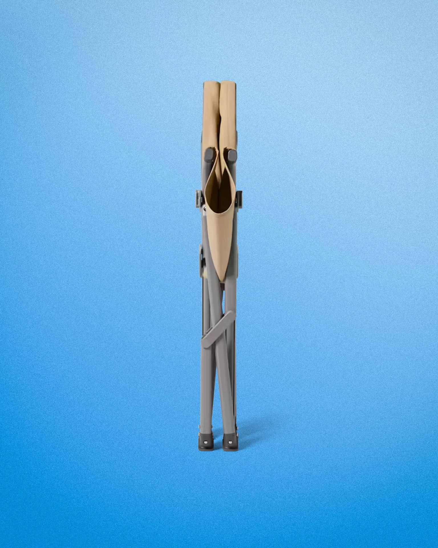 Folded beige and gray portable camping chair against a blue gradient background.