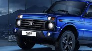 Blue Lada Niva Legend SUV front with black grille and alloy wheels in indoor setting.