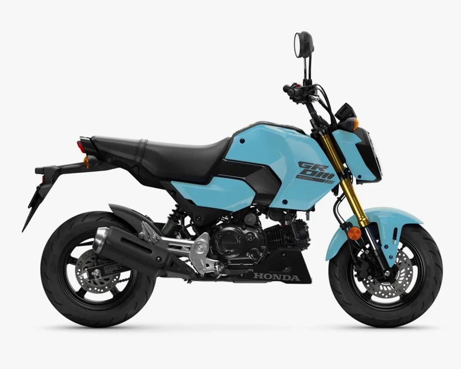 Light blue Honda Grom motorcycle with black seat and gold front forks on a white background.