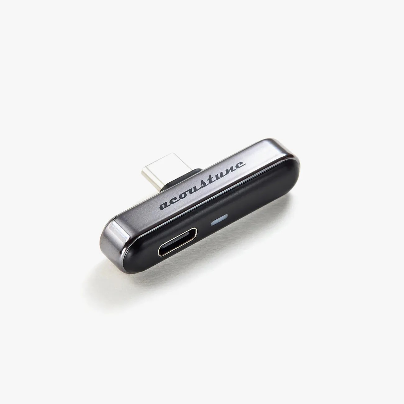 Black and metallic USB-C audio adapter with "acoustune" branding on a white background.