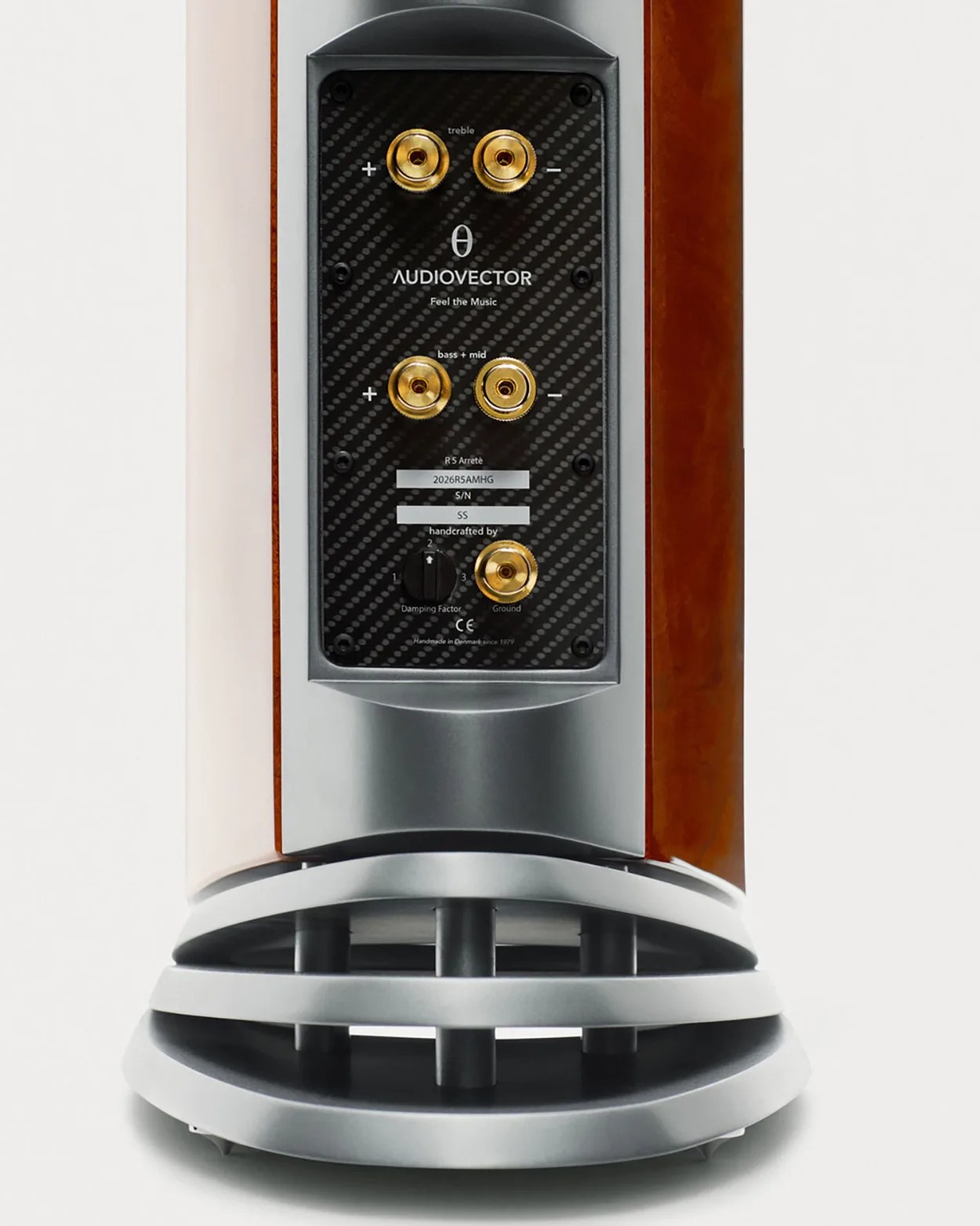 Rear panel of an Audiovector R5 Arreté speaker showing gold-plated audio connectors and a damping factor dial.