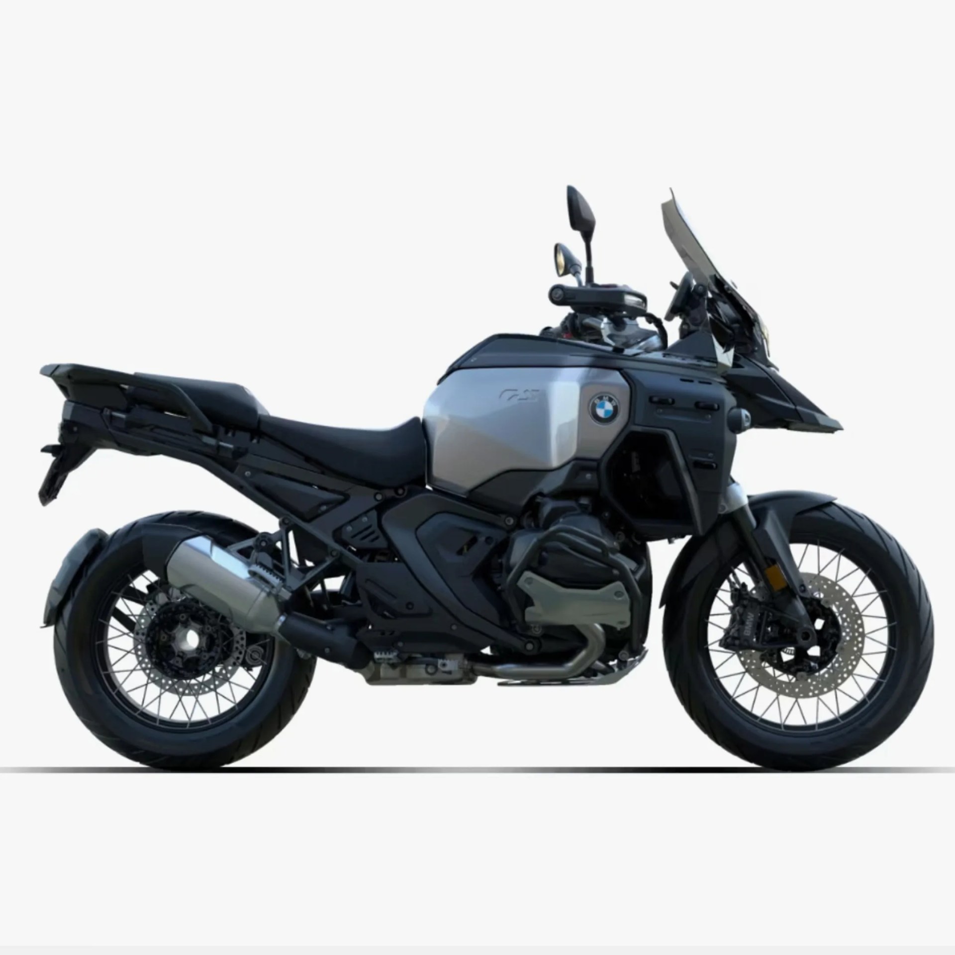 Silver and black BMW adventure motorcycle with windshield and spoked wheels on a white background.