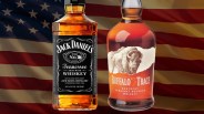 Two whiskey bottles, one Jack Daniel's Tennessee Whiskey and one Buffalo Trace Kentucky Straight Bourbon, with an American flag background.