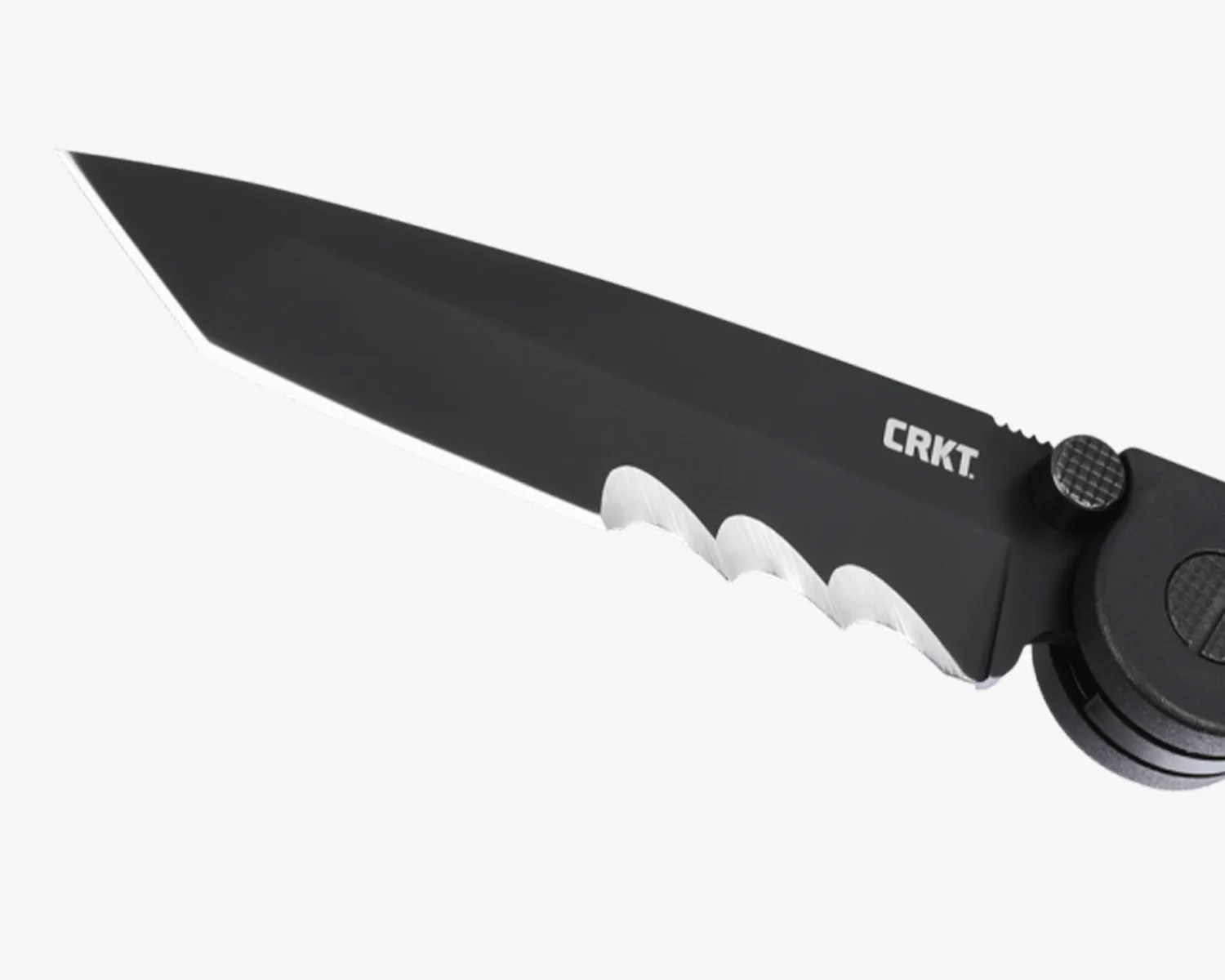 Black partially serrated folding knife blade with CRKT logo and textured thumb stud.