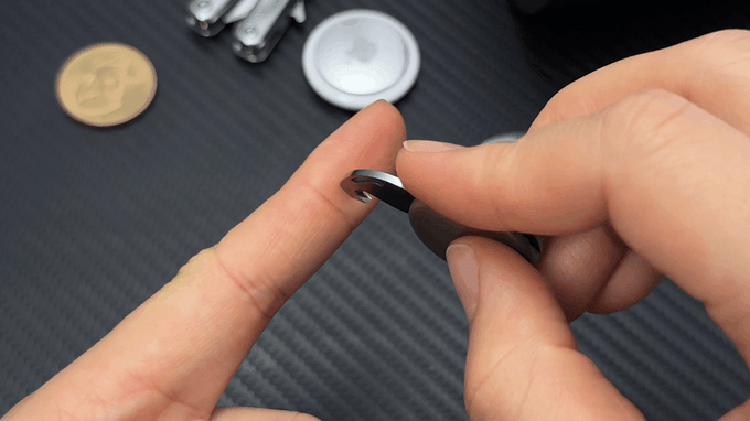 Person demonstrating tiny multi-tool blade safety
