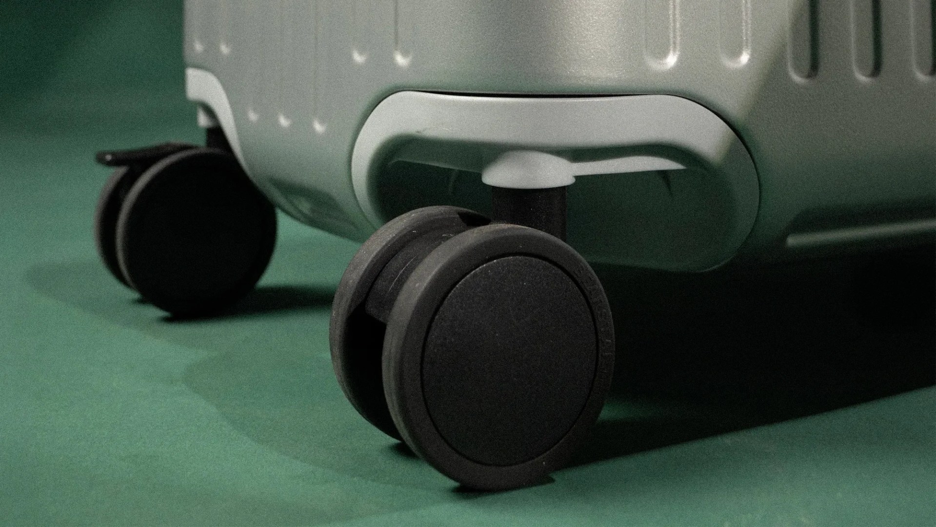 This Aluminum Carry-On Fixes the Least Convenient Thing About Travel Luggage