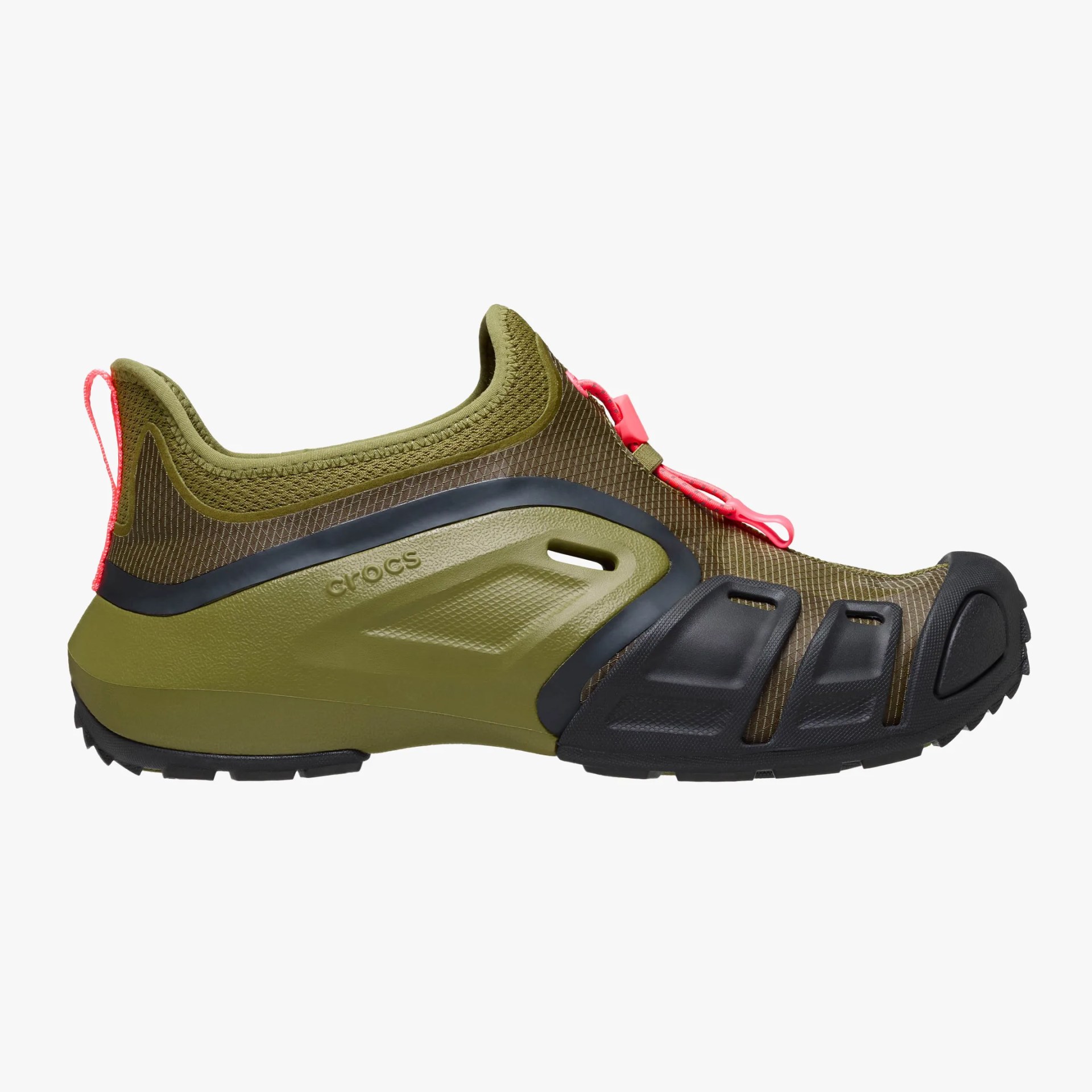 Olive green and black Crocs shoe with pink laces and textured upper.