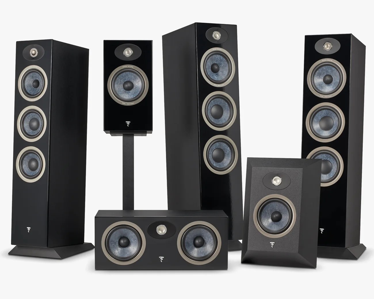 Set of six black high-fidelity speakers with blue-gray cones and silver rings, including floor-standing, bookshelf, and center channel models.