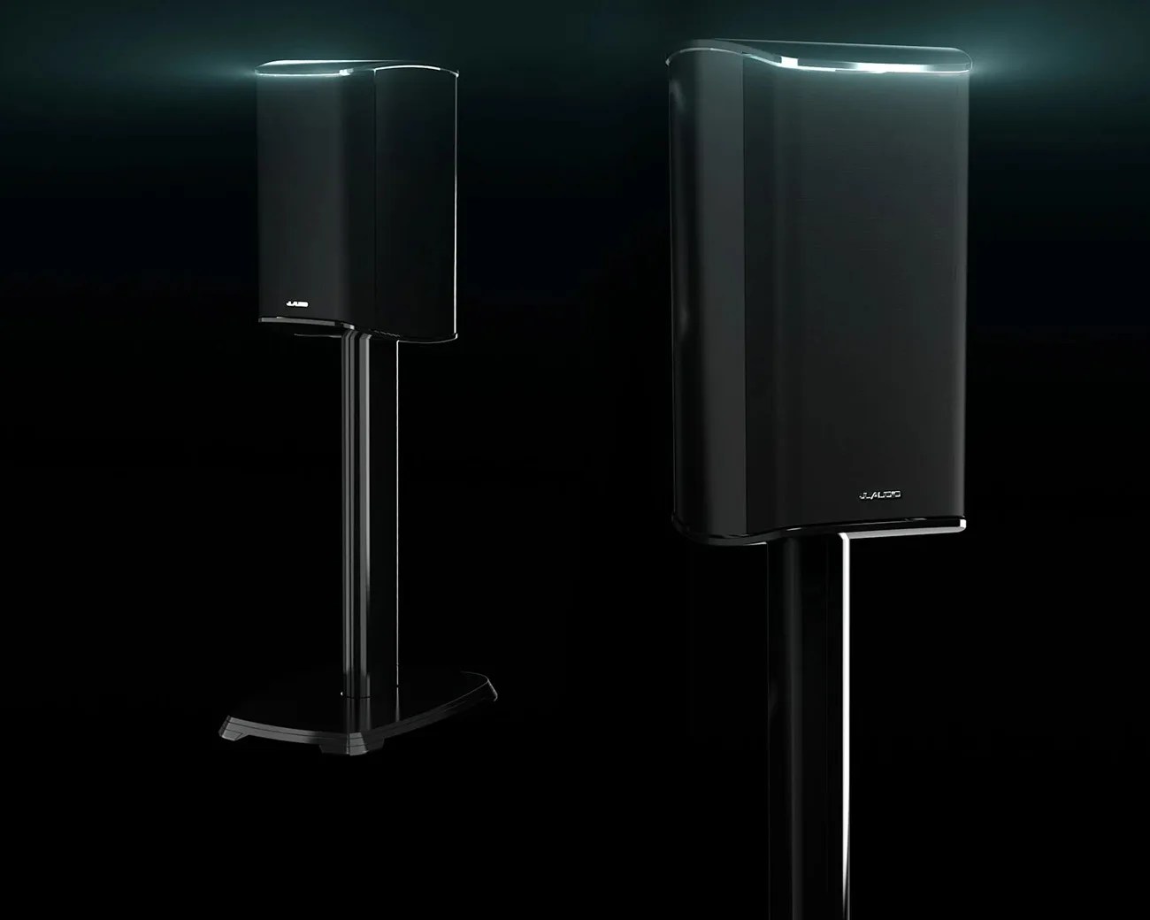 Glossy black modern speaker on a matching black stand against a dark background.
