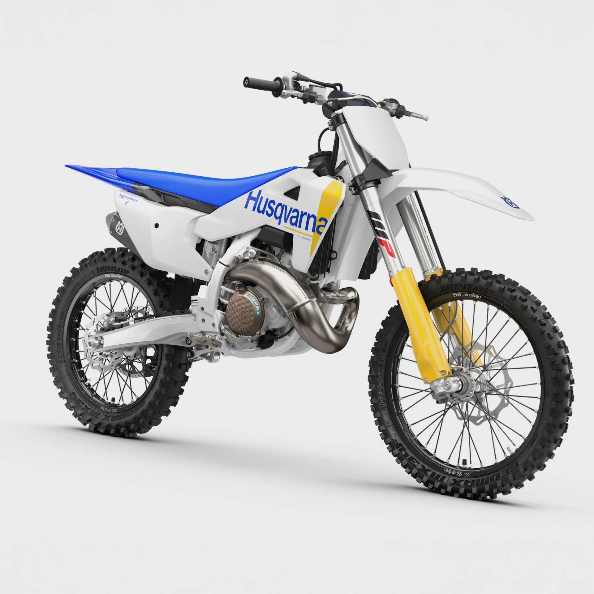 White and blue Husqvarna TC 250 dirt bike with yellow front forks and knobby tires on a white background.