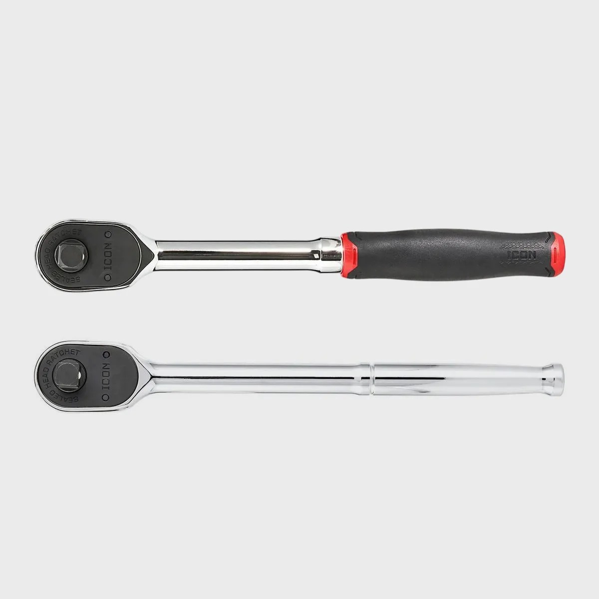 Two chrome ratchet wrenches, one with a black and red rubber grip handle and one with a smooth metal handle, laid side by side on a white background.