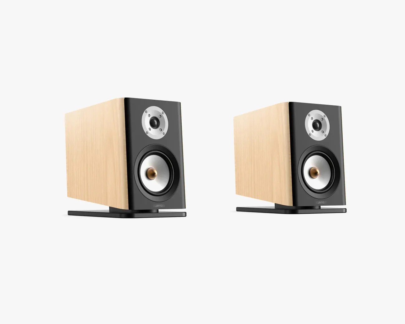Pair of bookshelf speakers with light wood sides and black front panels on black stands.