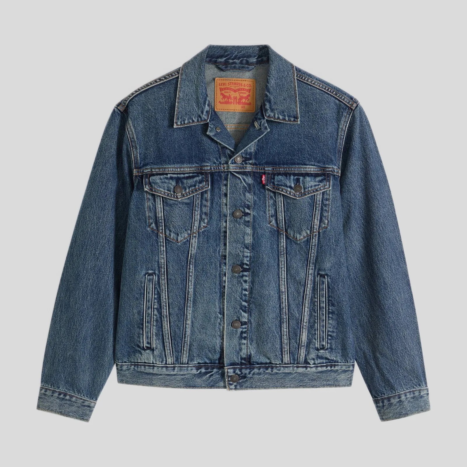 Classic blue Levi's denim jacket with button front and chest flap pockets.