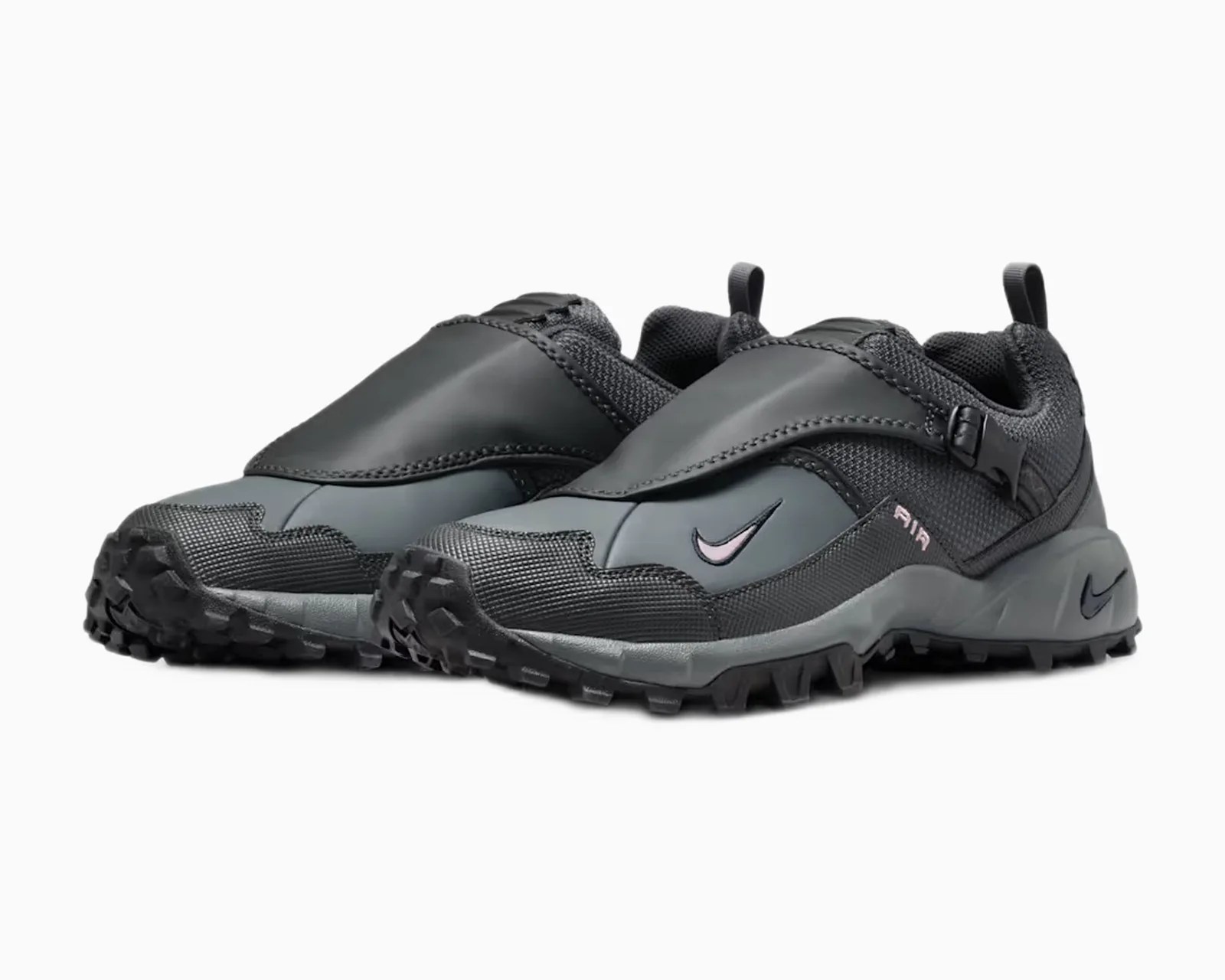 Pair of black and dark gray Nike trail running shoes with textured soles and a protective overlay across the top.