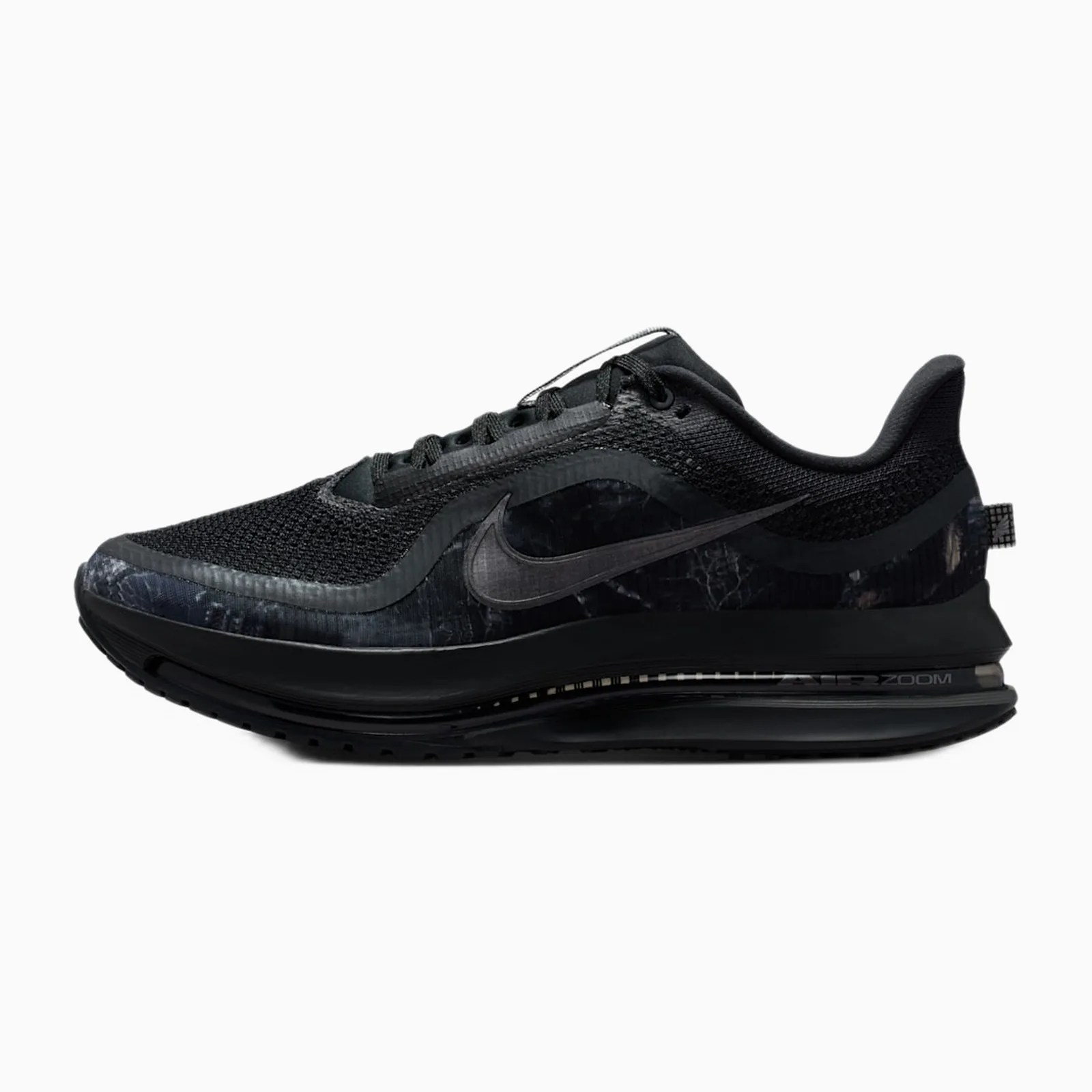 Black Nike Air Zoom running shoe with mesh upper and visible air cushion sole.