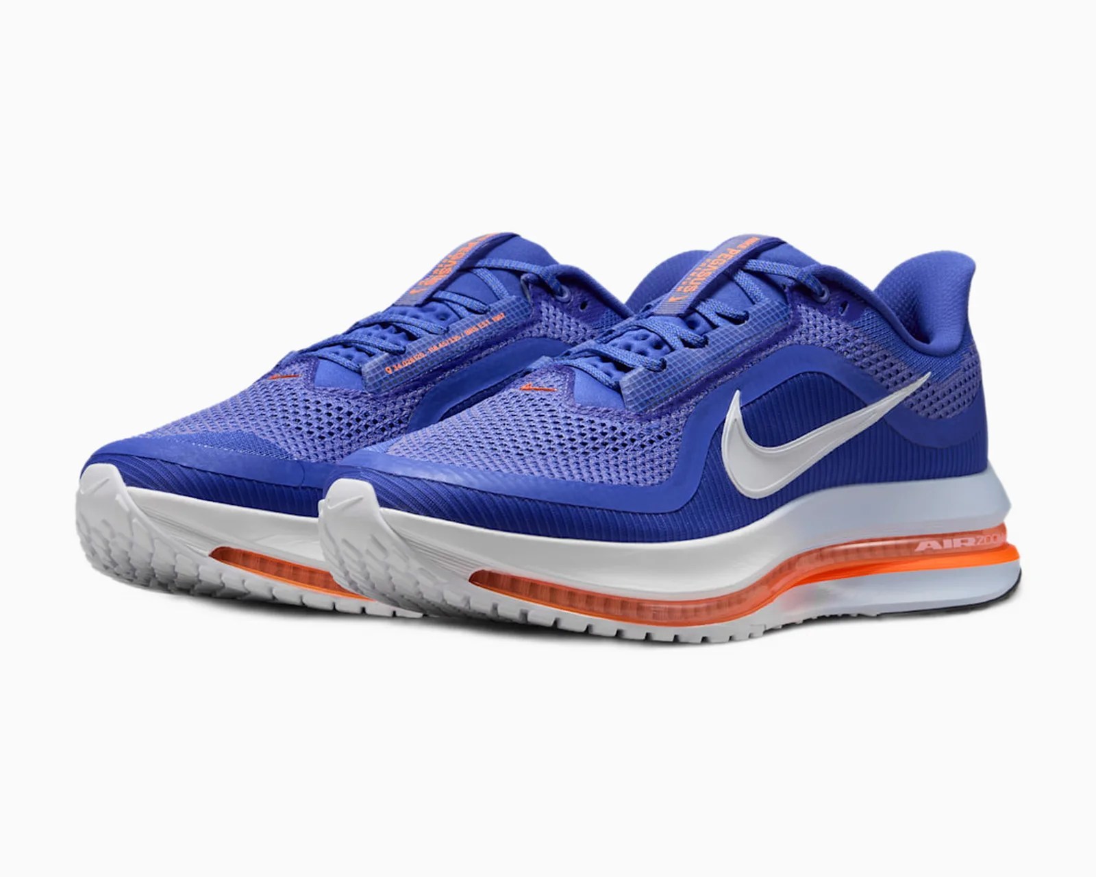 Pair of blue Nike Air Max running shoes with white soles and orange air cushion detail.