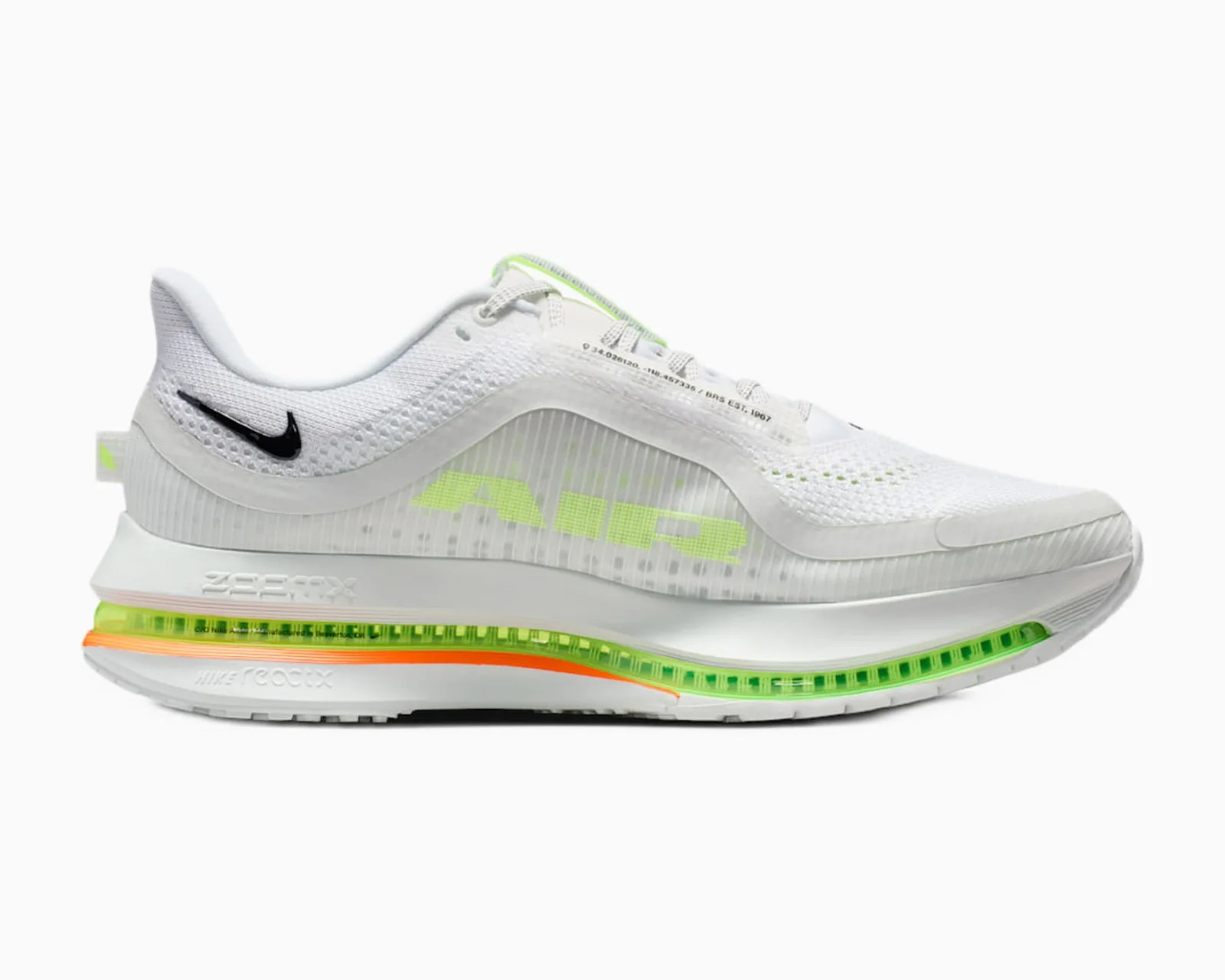 White Nike Air running shoe with neon green and orange accents and a black Nike swoosh logo.